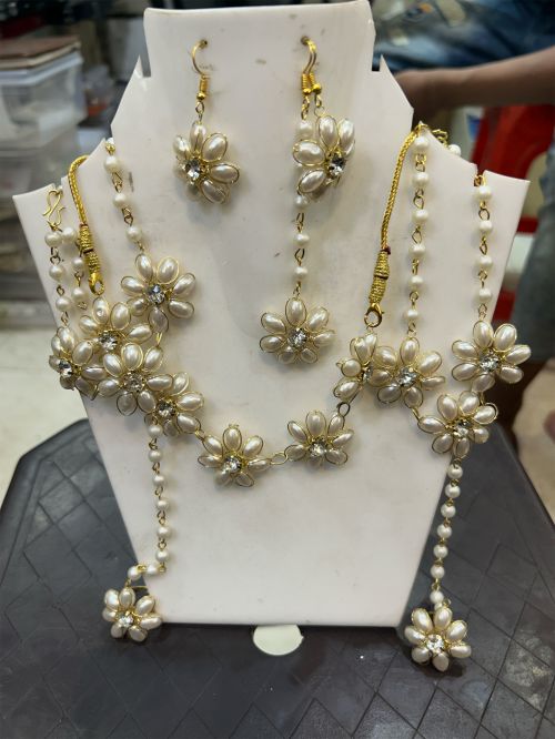 Pearl haldi mehandi jewellery